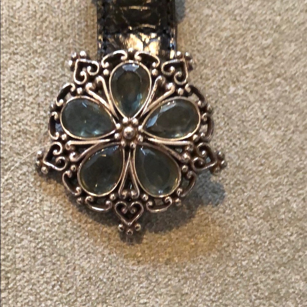 Black leather belt with silver jeweled buckle